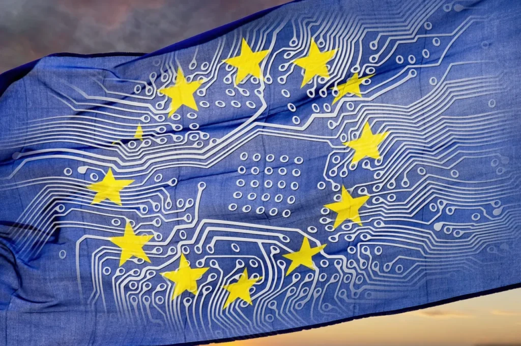 Le dodici stelle della bandiera europea su uno Stendardo blu che riporta il disegno di un circuito stampato